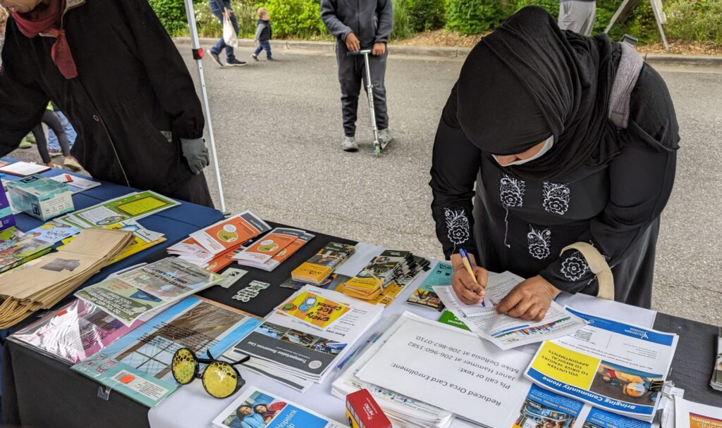 Folks engage with the Community Transportation Navigators at outreach events to learn about transportation services available to them.  