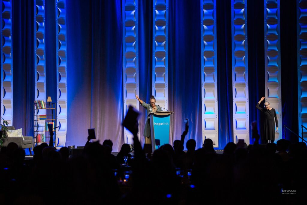 Speaking on the impact of our Food Markets, Amanda Lopez-Castañon touched on her personal journey and led the room in giving to support Hopelink’s programs and services at the Reaching Out Luncheon